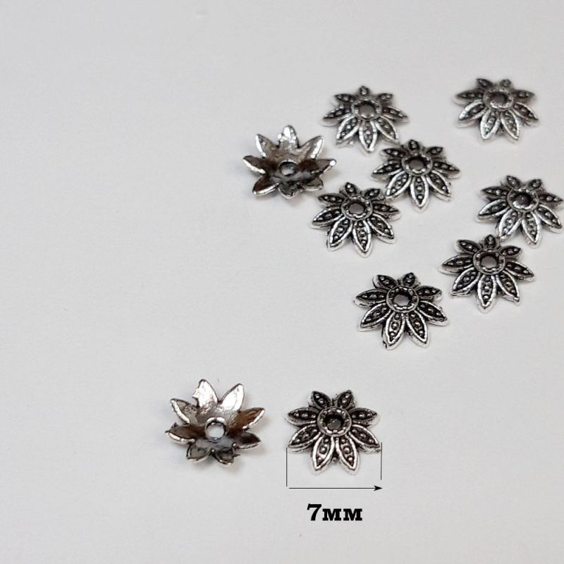 картинка Шапочки для бусин 7х2мм-10шт цв.серебро, отверстие 1мм от магазина Пряжа Макошь Ярославль