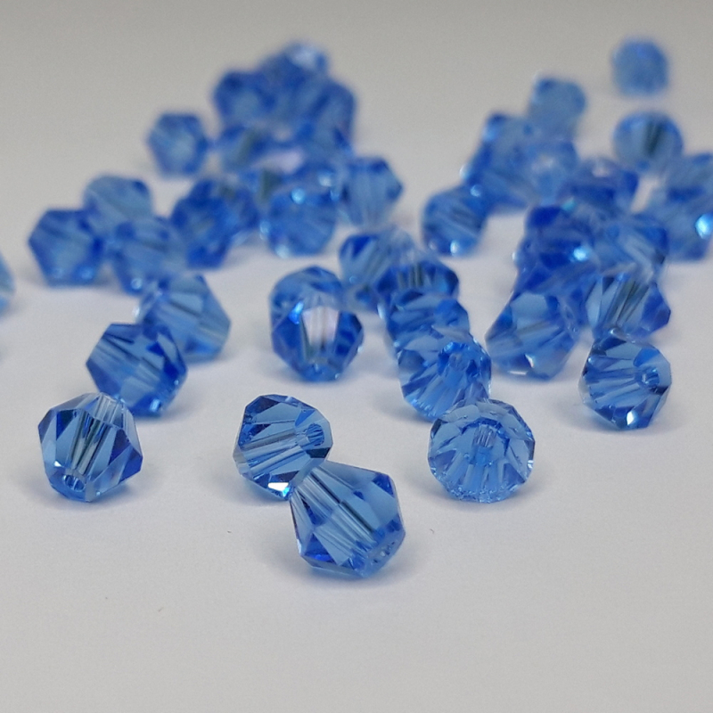 картинка Бусины Биконус 6мм-10±1шт. цв.46-голубой прозрачный от магазина Пряжа Макошь Ярославль
