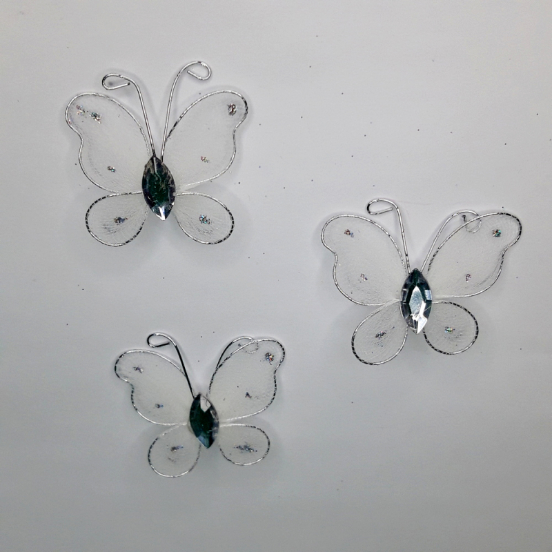 картинка Бабочка капроновая 3.5 х 4.0см цв.белый от магазина Пряжа Макошь Ярославль